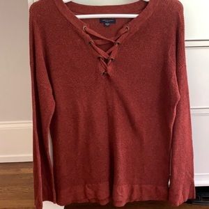 American Eagle Jegging Fit oversized rusty red sweater.